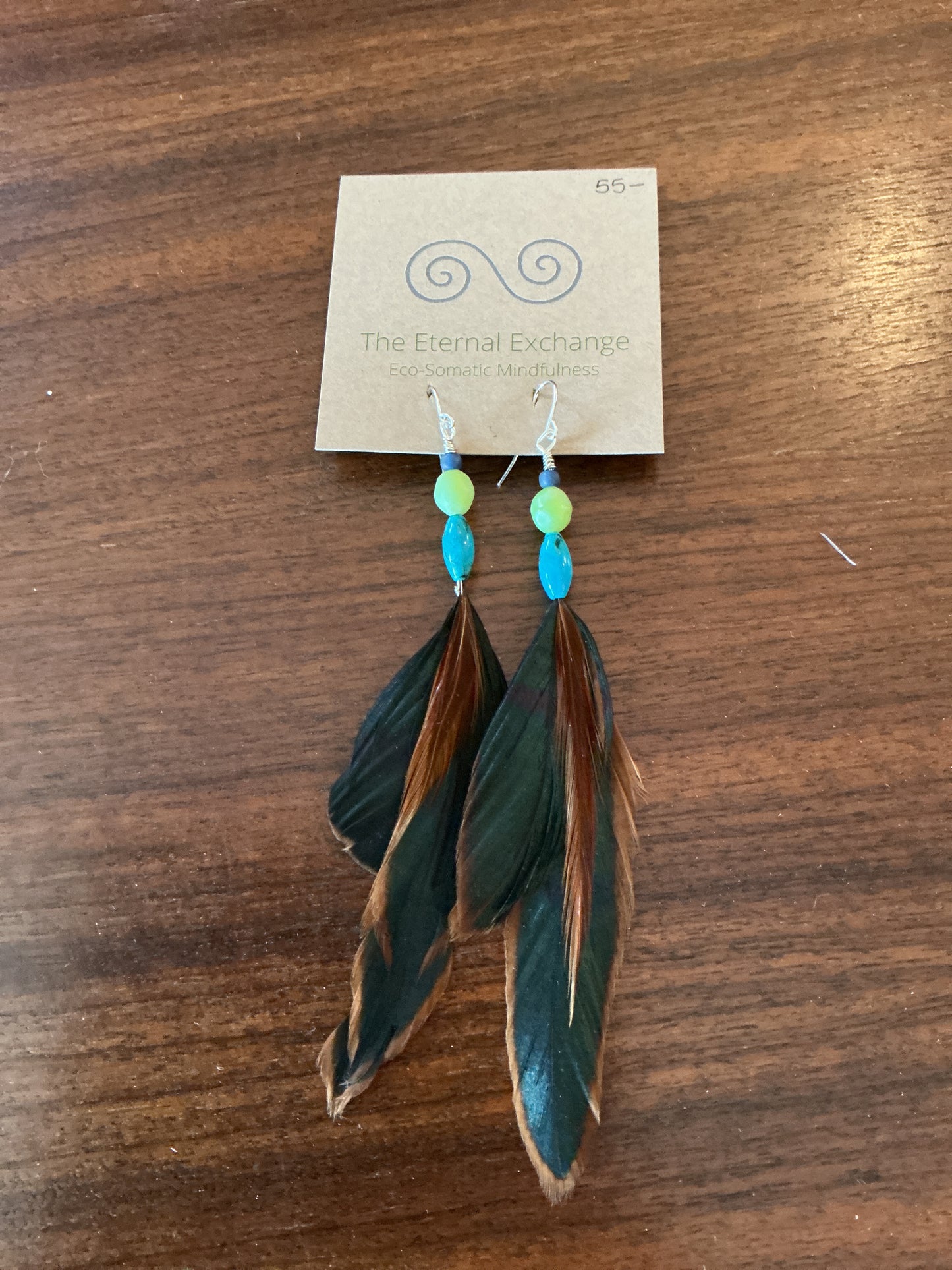 Feathered Earrings with green, grey, and blue beads