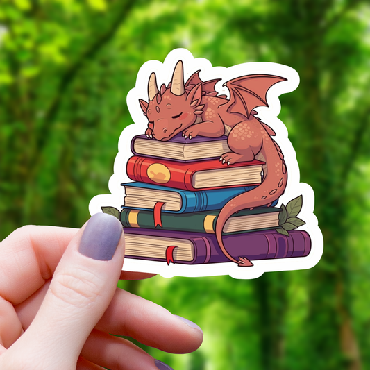 Dragon Sleeping on Pile of Books Sticker